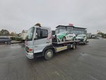 Policijos automobilio pervežimas evakuatoriumi